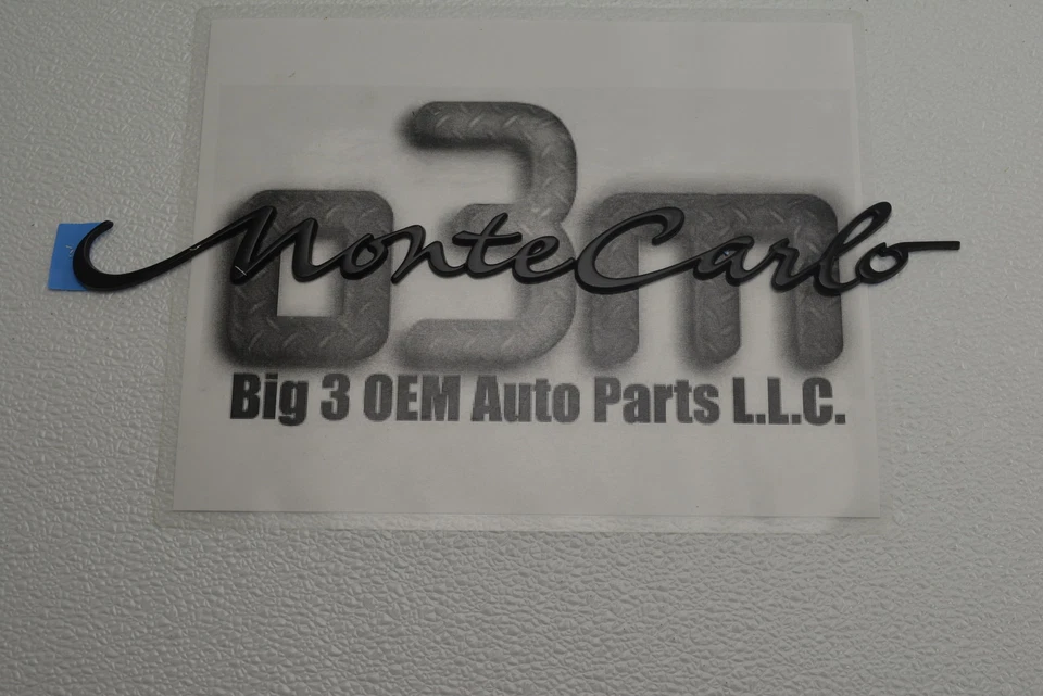 2000-2005 Chevrolet Monte Carlo Black Quarter Panel Emblem Nameplate new OEM - Image 1 of 4