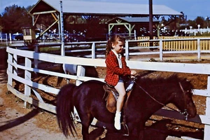 1950's Red Border Kodachrome Slide, Young Girl riding a Horse / Stables - Picture 1 of 1