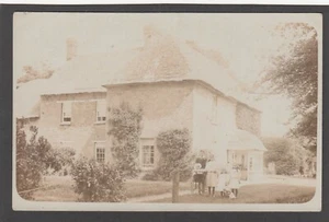 Postcard Unlocated large thatched family house with children outside early RP - Picture 1 of 3