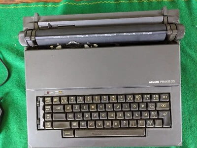 Machine à écrire électrique  OLIVETTI PRAXIS 20   portable - Photo 1/4