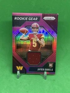 2024 Panini Prizm - Rookie Gear Jayden Daniels #RG-JDS Pink Prizm (MEM, RC) - Bild 1 von 2