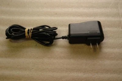 ADAPTADOR DE CORRIENTE EXTRACTOR DE LECHE ORIGINAL AMEDA 9V 1.3A 110-240V EE. UU. Foto 1 de 4