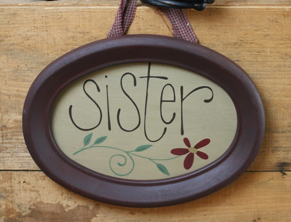 Placa Hermana con Flor Primitiva Decoración de Pared Ovalada Enmarcada Madera Borgoña Tostado Foto 1 de 1