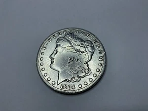 Dólar de plata Morgan 1884 (Casa de la Moneda de Filadelfia) en muy buen estado-07 - Imagen 1 de 2