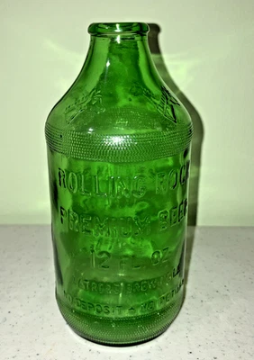 Botella de cerveza Rolling Rock vintage - en relieve - cabezas de caballo - 12 OZ 6 pulgadas de alto - sin tapa Foto 1 de 4