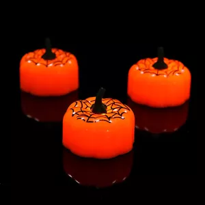 Luz LED de té de calabaza de Halloween 12 velas sin llama decoración de fiesta alimentación a batería - Imagen 1 de 14