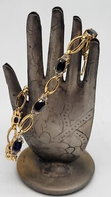 Brazalete estilo tenis tono dorado zafiro azul y circonita cúbica 7,5 pulgadas  Foto 1 de 4