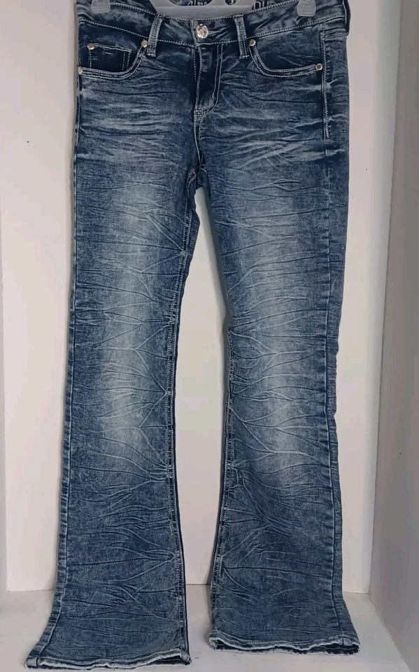 Pantalones de mezclilla para niñas casi famosas corte bota lavado ácido talla 5 Foto 1 de 4