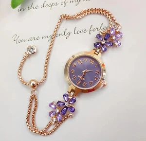 Women's bohemian rhinestone flower watch with sliding bezel MLA-T0060A - Picture 1 of 1