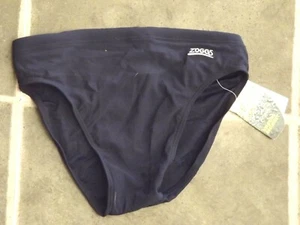 BRANDNEU MIT ETIKETT JUNGEN MARINEBLAU BADEHOSE VON ZOGGS J30" JUNIOR RACER TAILLE 24" - 26" - Bild 1 von 1