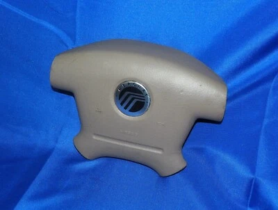 Bolsa de aire para volante izquierdo Mercury Mountaineer 2002-2005 color tostado OEM Foto 1 de 4