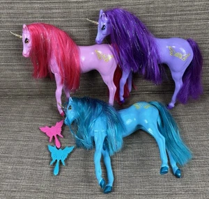 5 Stück MGA Dream Ella Einhorn Pferde CHERRY PINK, FLIEDER LILA & OZEANBLAU - Bild 1 von 24
