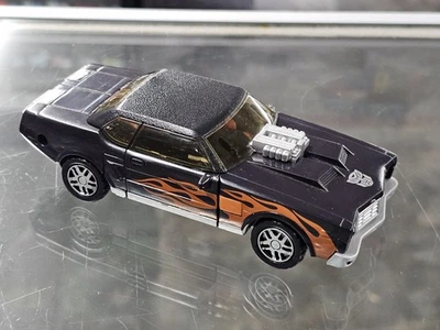 Hasbro Takara Big Daddy Transformers 2005 Autobot Muscle Car Robot negro naranja Foto 1 de 4