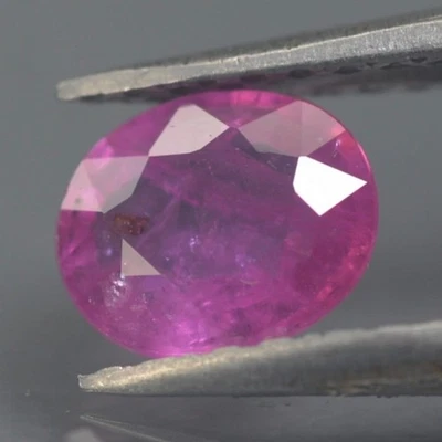 0.66 CT.  6x5 Natural Ruby Oval Madagascar Pinkish Red Heated by fire only - Image 1 of 2