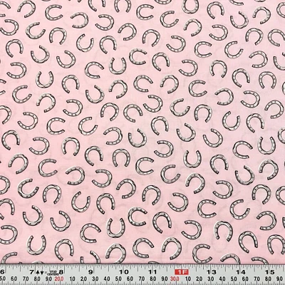 Timeless Treasures Horseshoes on Pink Cotton Fabric by the HALF YARD - Image 1 of 2