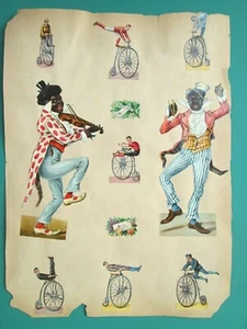 Página de álbum de recortes victoriano troquelados con juglares negros y trucos de bicicleta de rueda alta - Imagen 1 de 7