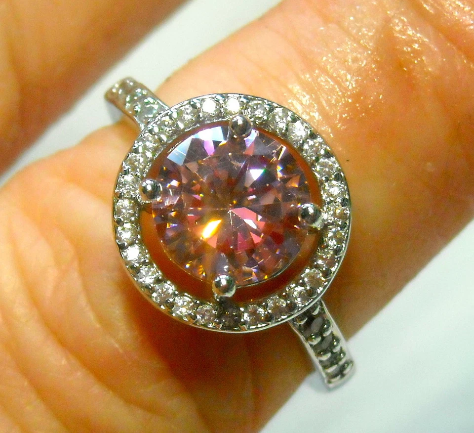 Anillo enchapado en plata talla 6 con halo de topacio rosa y blanco de 1,10 quilates Foto 1 de 1
