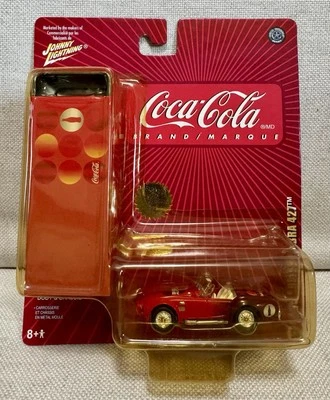🔥Johnny Lightning 1965 Shelby Cobra 427~Coca-Cola~Coke~Tin~Red~#11 - Image 1 of 4