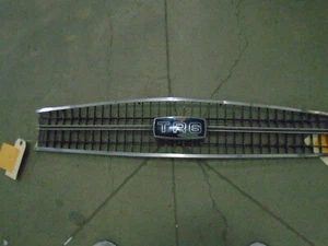 Triumph TR6 Front Grille, center badge has big chips , ( NOF ) - Picture 1 of 15
