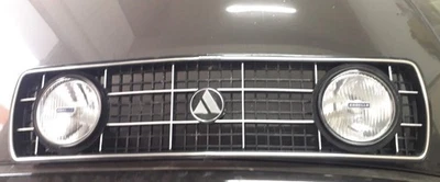 MASCHERINA GRIGLIA ANTERIORE + FENDINEBBIA CARELLO AUTOBIANCHI A112 2 3 SERIE - Immagine 1 di 3