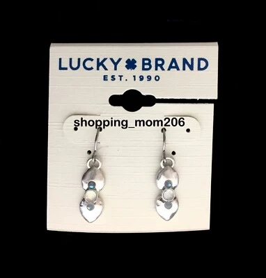Pendientes Lucky Brand acabado martillado tono plata mate con piedra y cristales cortados Foto 1 de 3