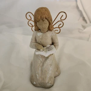 Ángel de porcelana arrodillado y leyendo un libro - Imagen 1 de 2