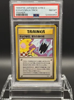 PSA 8 Japanese Koga’s Ninja Trick Trainer 🚫Banned Artwork🚫 1999 Pokémon Gym 2 - Image 1 of 3
