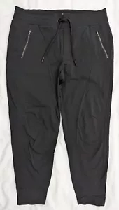 Pantalones de chándal activos Athleta para mujer 14 negros Trekkie bolsillo norte con cordón - Imagen 1 de 5