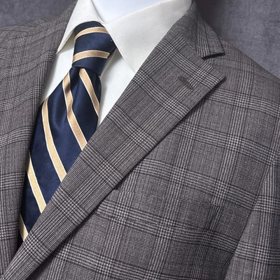 Abrigo deportivo Jos A Bank 42S calce ajustado tecnología de viaje marrón a cuadros lana Blazer Foto 1 de 4