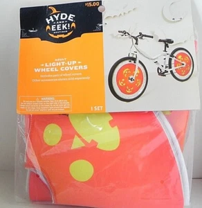 Hyde and Eek Light Up Cubiertas de Rueda de Bicicleta Naranja Calabaza Cara Ruedas Luces NUEVO - Imagen 1 de 4