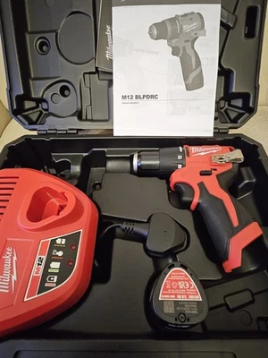 Milwaukee M12 Blpdrc Hammer Drill Battery 2ah Charger New - Image 1 of 3