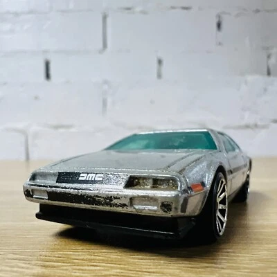 81 DMC-12 DeLorean Silver 2010 New Models 10SP 15/44 Premiere 16/52 - Image 1 of 4