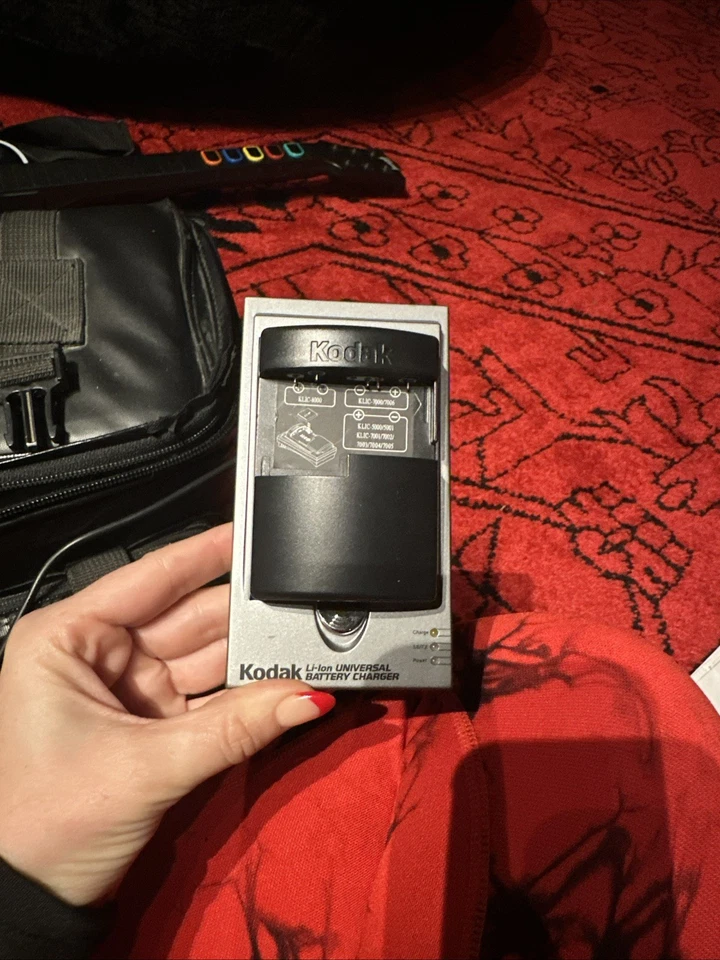 Cargador de batería universal Kodak K & 600 Li-Ion y manual   Foto 1 de 2