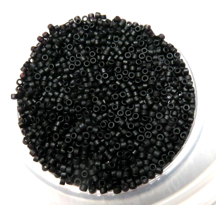 11/0 DELICA ~ DB 310 ~ NEGRO MATE ~ 7 gramos ~ CUENTAS DE SEMILLAS DE VIDRIO Foto 1 de 1