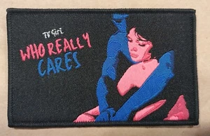TV Girl Who Really Cares Black Border Woven Patch Sew On - Picture 1 of 1