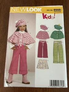 New Look Pattern 6555 Girl's Cape Coat Pants Capris Skirt Hat Size 3-8 Uncut - Picture 1 of 4