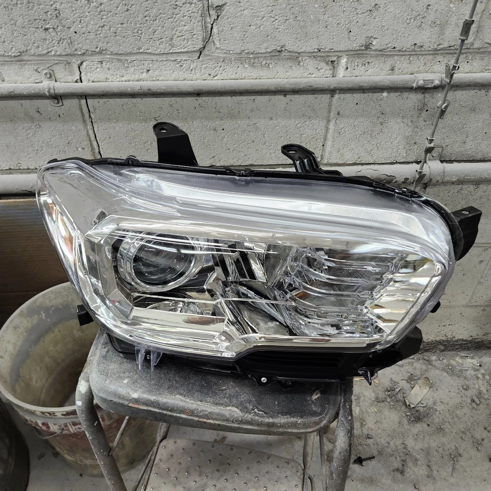 Headlight Assembly-Regular TYC 20-9749-00 fits 16-18 Toyota Tacoma - Image 1 of 4