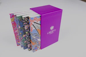 LIBERTY LONDON Set of 5 Mini Notebooks Compendium in Purple Slip Case NEW - Picture 1 of 7