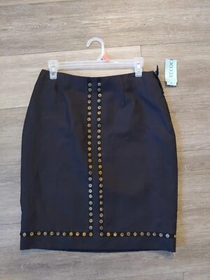 NUEVO CON ETIQUETAS ECCOCI Falda Negra Color Sólido con Tachuelas Doradas tallas 4 $285. Foto 1 de 4