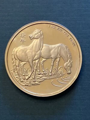 Moneda de prueba Singapur 1990 1 oz chapada en plata/oro año del caballo Foto 1 de 4