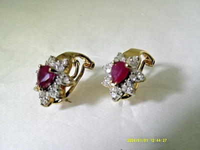 RUBY AND DIAMOND EARRINGS SET IN 14KT GOLD WITH OMEGA BACKS PRONG AND BEZEL SET - Image 1 of 4