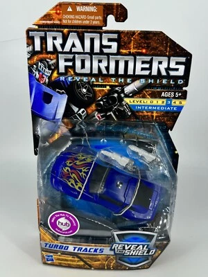 TURBO TRACKS, Transformers Reveal the Shield Deluxe action Figure - Image 1 of 4