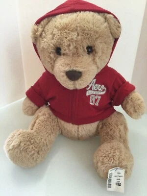 AEROPOSTALE Oso de Peluche Tostado Peluche con Capucha Roja con Cremallera 2010 Peluche Nuevo con Etiquetas Pintura Dañada Foto 1 de 4