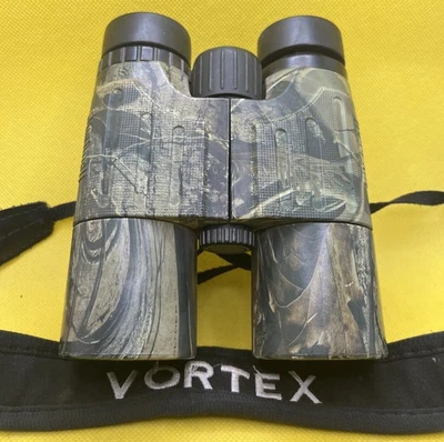 Binocular prisma techo impermeable Bushnell Trophy 10 x 42 (realtree AP camuflaje) Foto 1 de 4