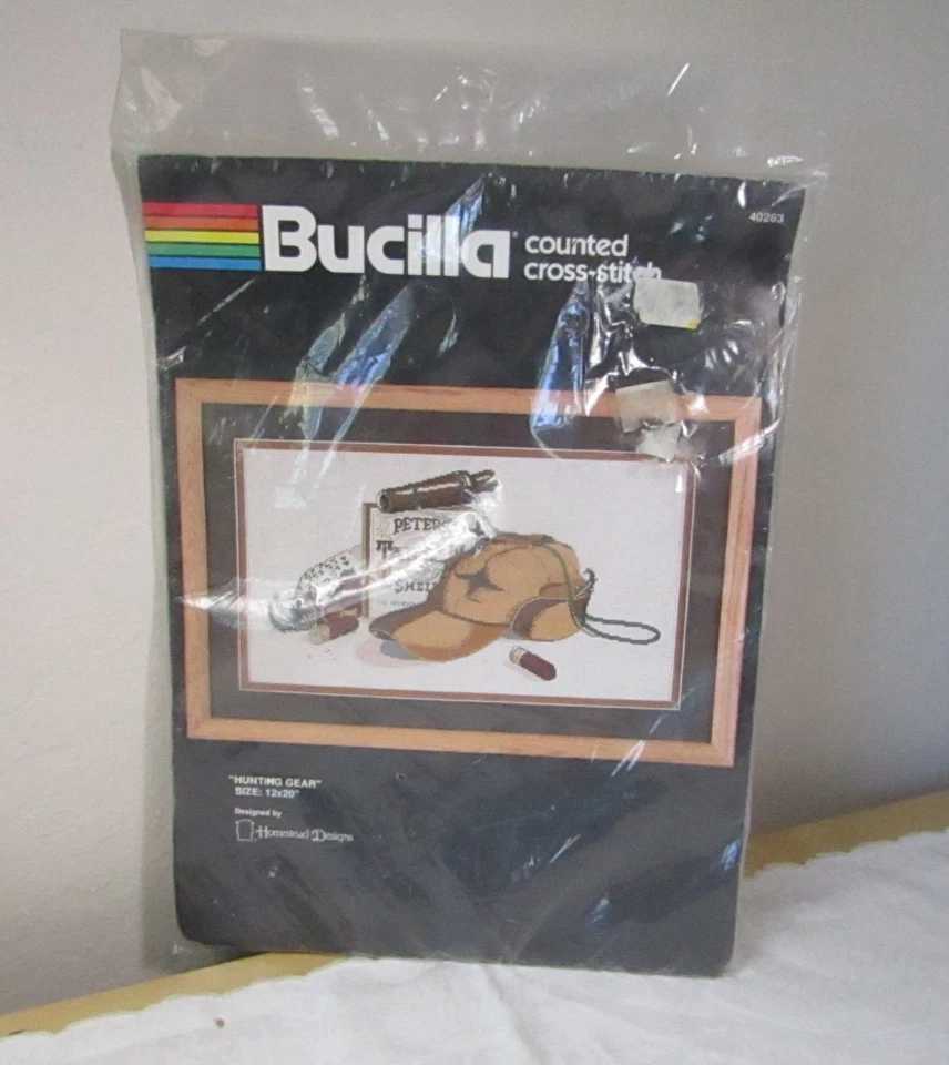 Bucilla Counted Cross Stitch Kit 40263 Hunting Gear Man Cave 12x20 - Sealed Pkg. - Image 1 of 4