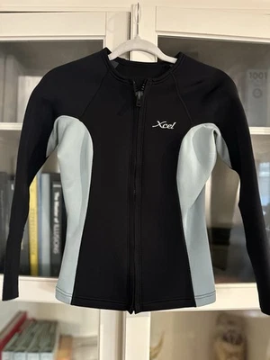 CHAQUETA XCEL MUJER SLX 2.0 MANGA LARGA CREMALLERA FRONTAL Talla 8 Negra/Azul Foto 1 de 4