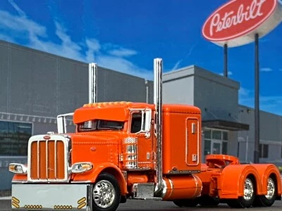1/64 DCP ORANGE PETERBILT 389 W/ 63" FLAT TOP SLEEPER - Image 1 of 4