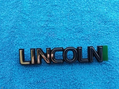 NOS FORD LINCOLN CONTINENTAL EMBLEM STRAIGHT NEW CHROME BLACK MARK V TOWNE CAR - Image 1 of 4