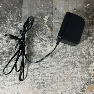 Adaptador de corriente alterna original Brother AD-E001A US 12V 2A para impresora de etiquetas - Imagen 1 de 5