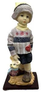 Little Girl In Sweater And Skirt Holding Bunny {17} - Picture 1 of 21